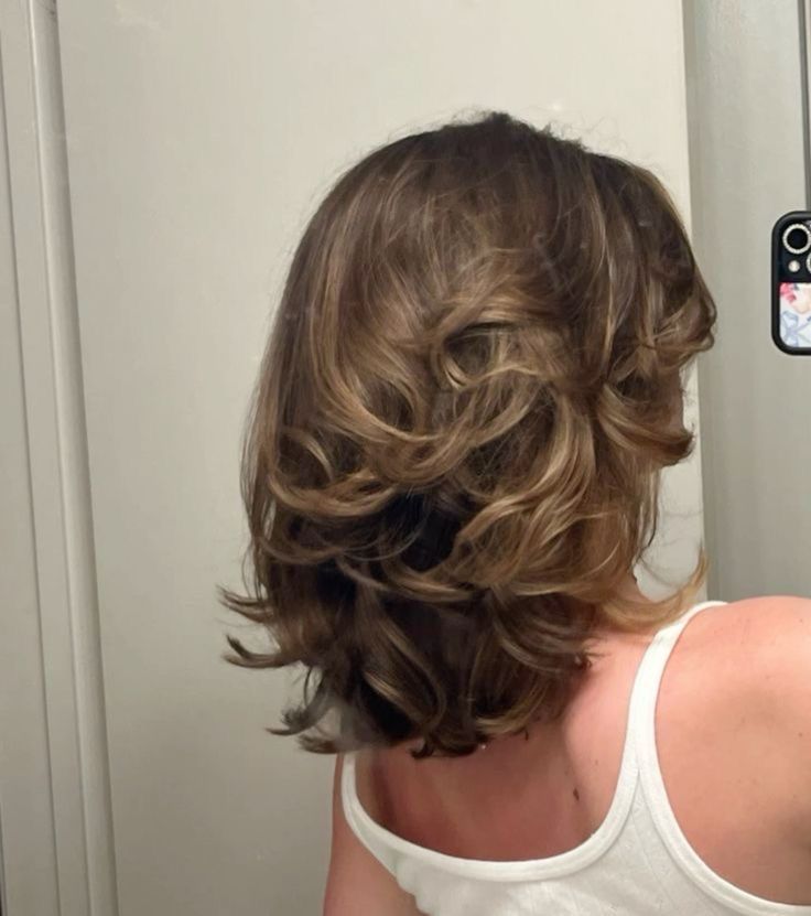 Short Bouncy Layered Bob