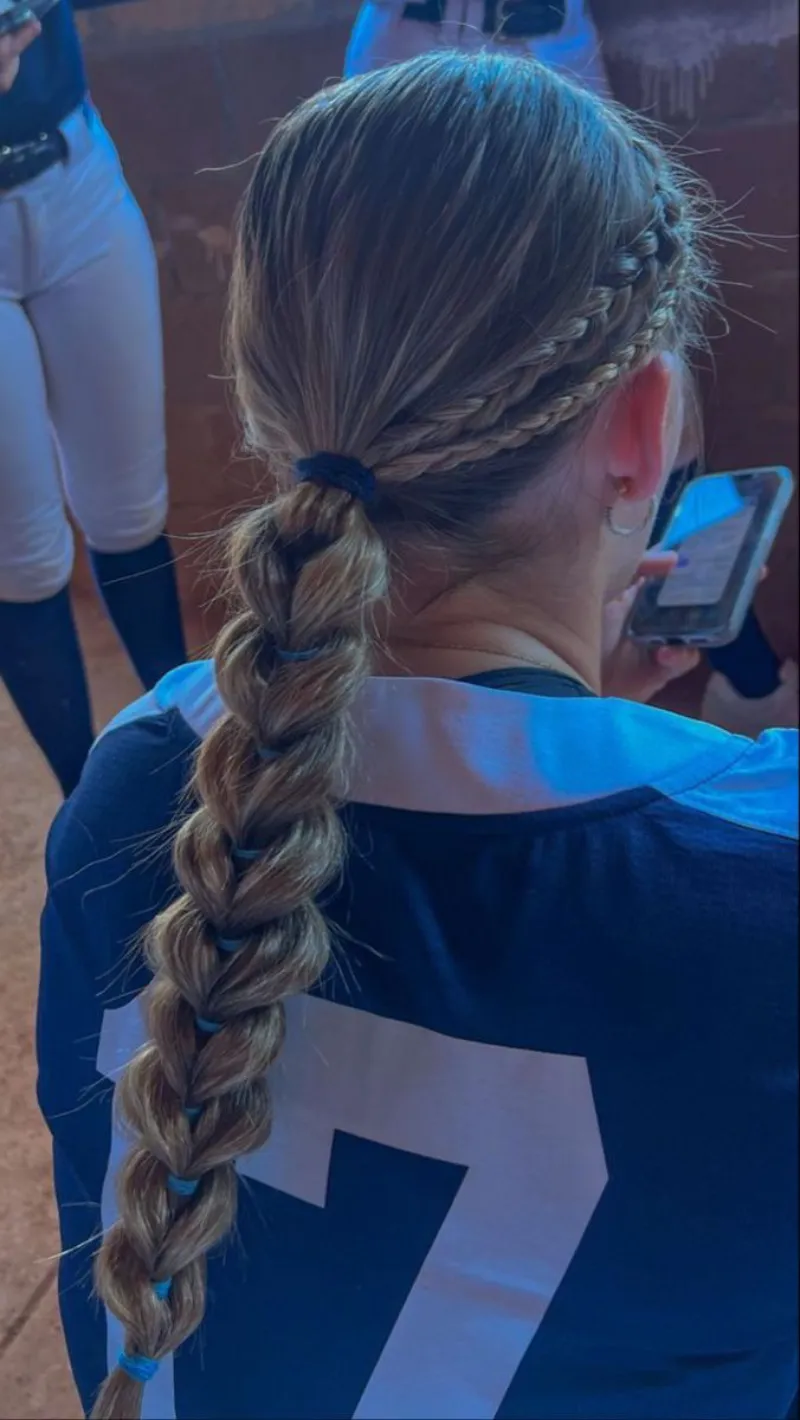 team spirit braided style softball hairstyle