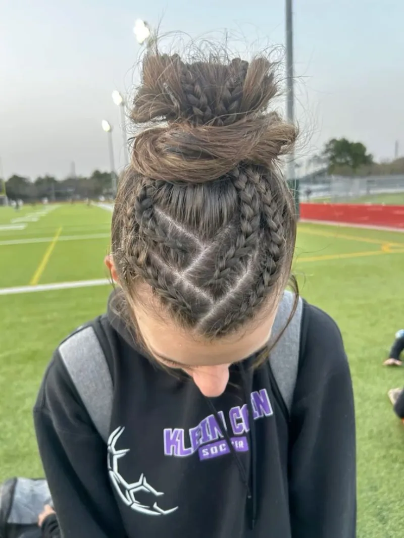 braided top bun for tracks softball hairstyle