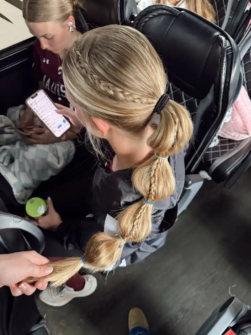 fishtail braid ponytail style softball hairstyle