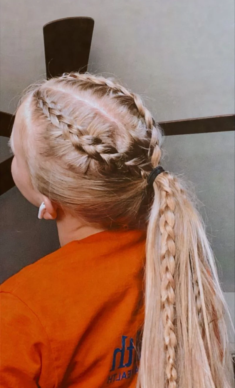 long braided ponytail with under braids softball hairstyle