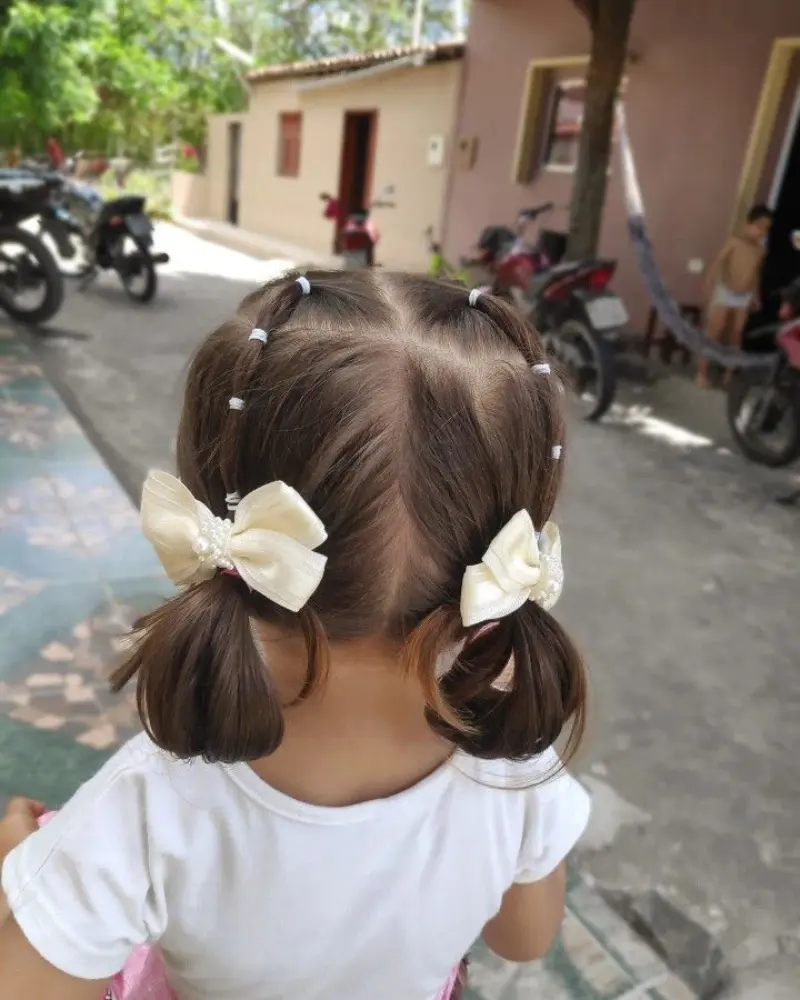 Double Ponytail with White Bow Daughter Hairstyle