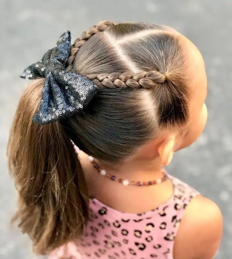 Sleek Pony with Black Bow Daughter Hairstyle