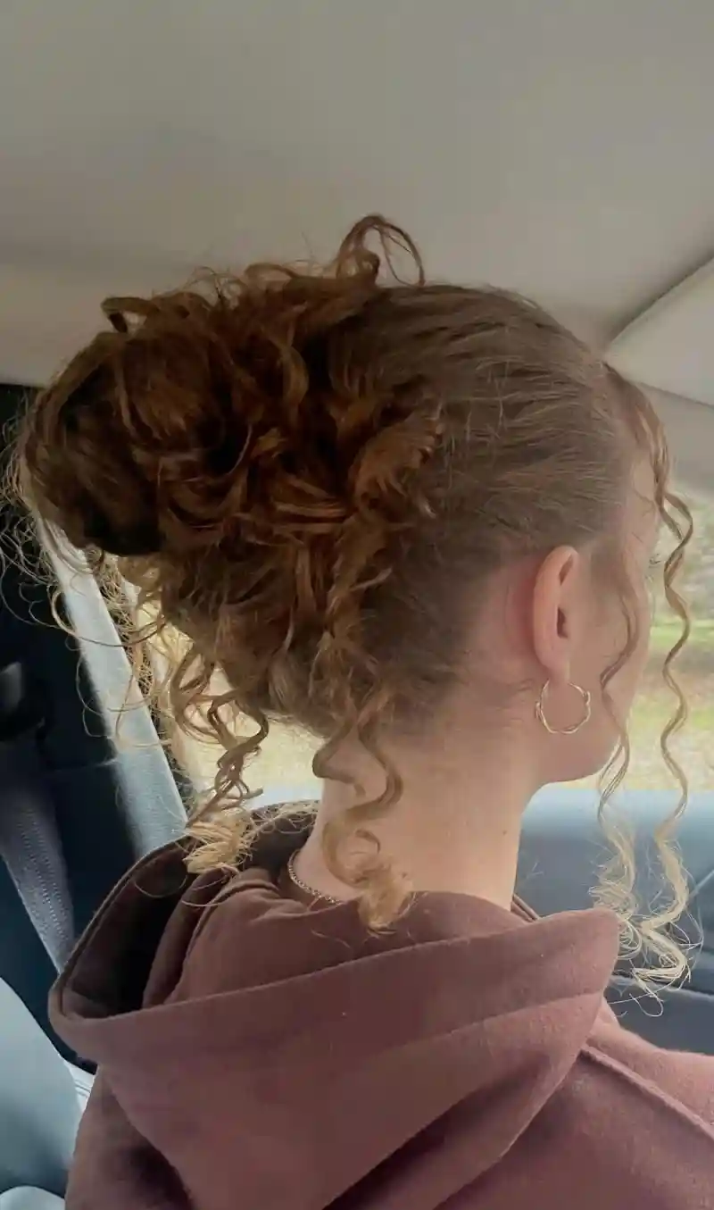 Messy Curly Bun Hairstyle for School