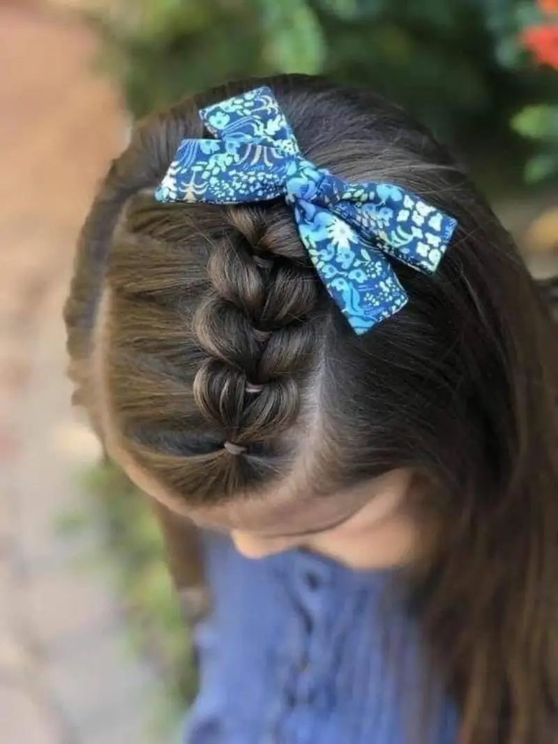 Side French Braid with Bow Fun Hairstyles for Kids