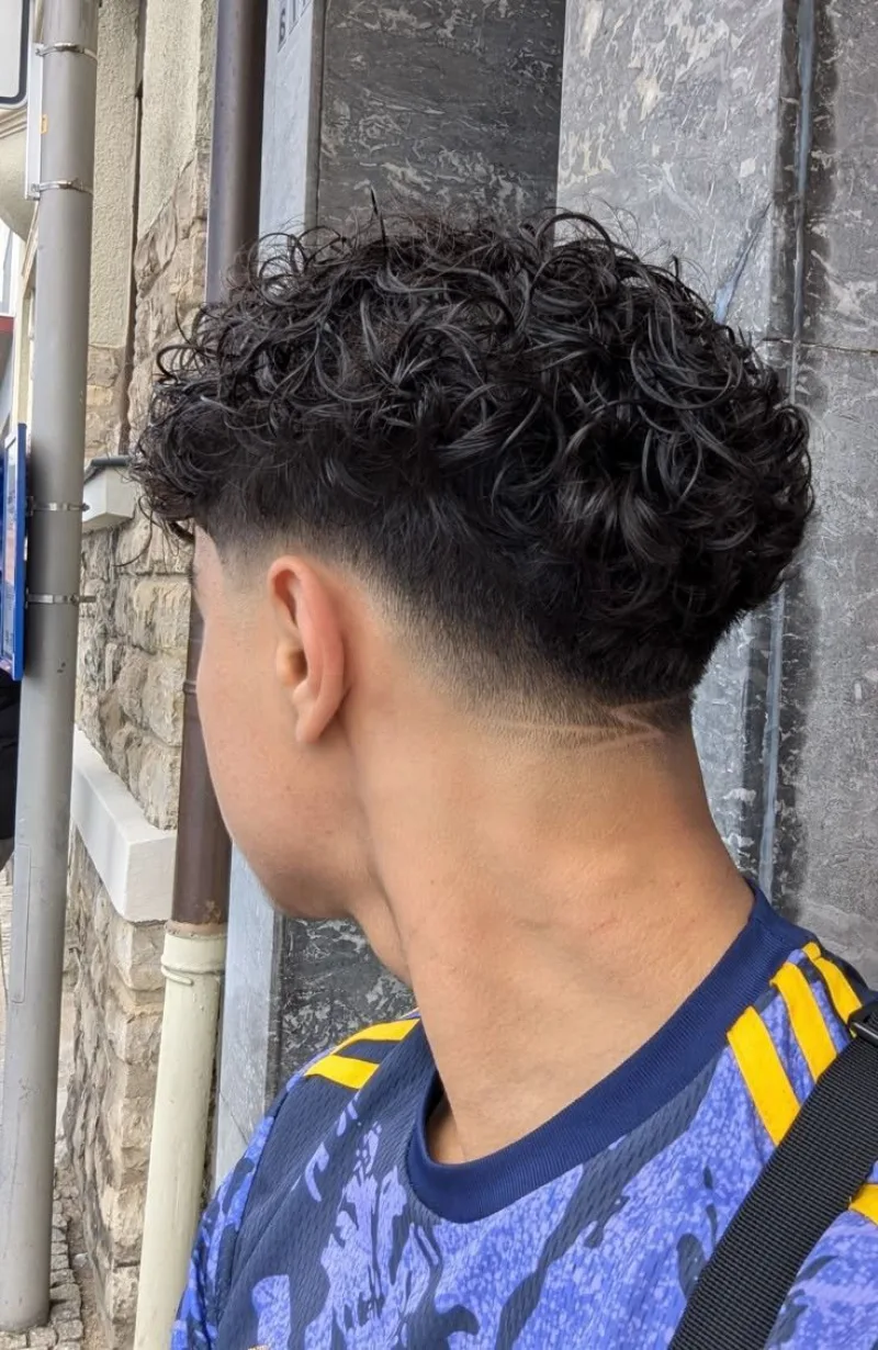 sharp curly fade style