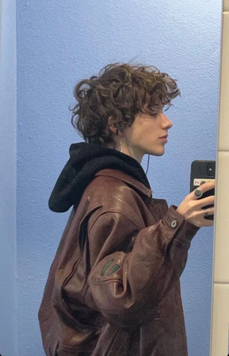 curly hair with taper sides