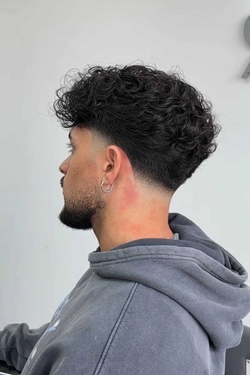 clean curly fade cut