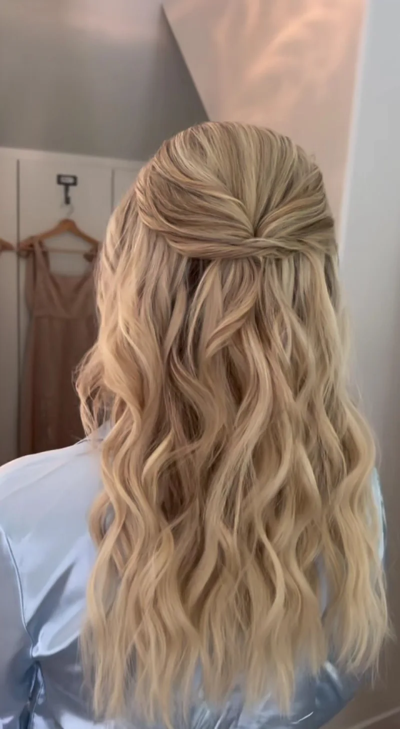 Half-Up Hair with Loose Curls homecoming hairstyle