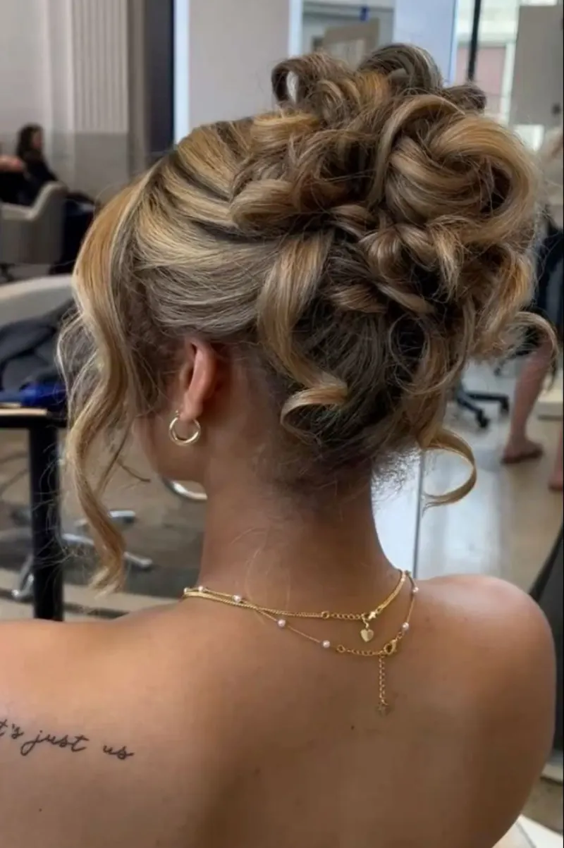 Elegant Twisted Updo homecoming hairstyle