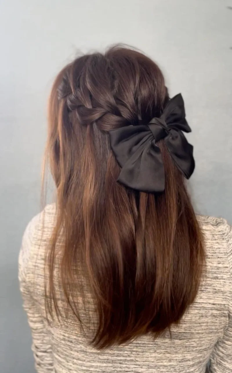 Straight Hair with Statement Bow homecoming hairstyle