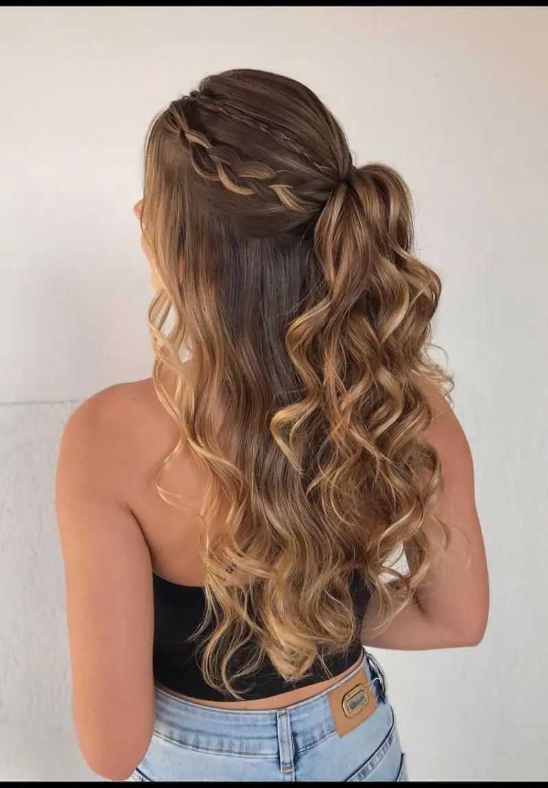 Side-Swept Curls with Volume homecoming hairstyle