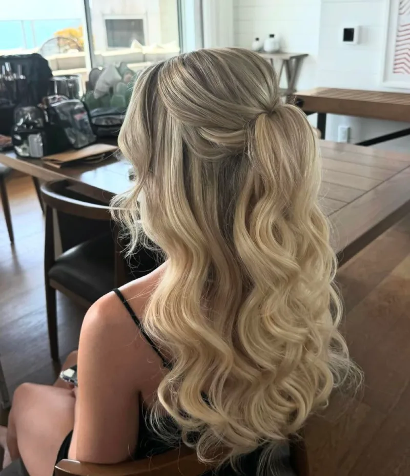 Classic Side-Swept Curls homecoming hairstyle
