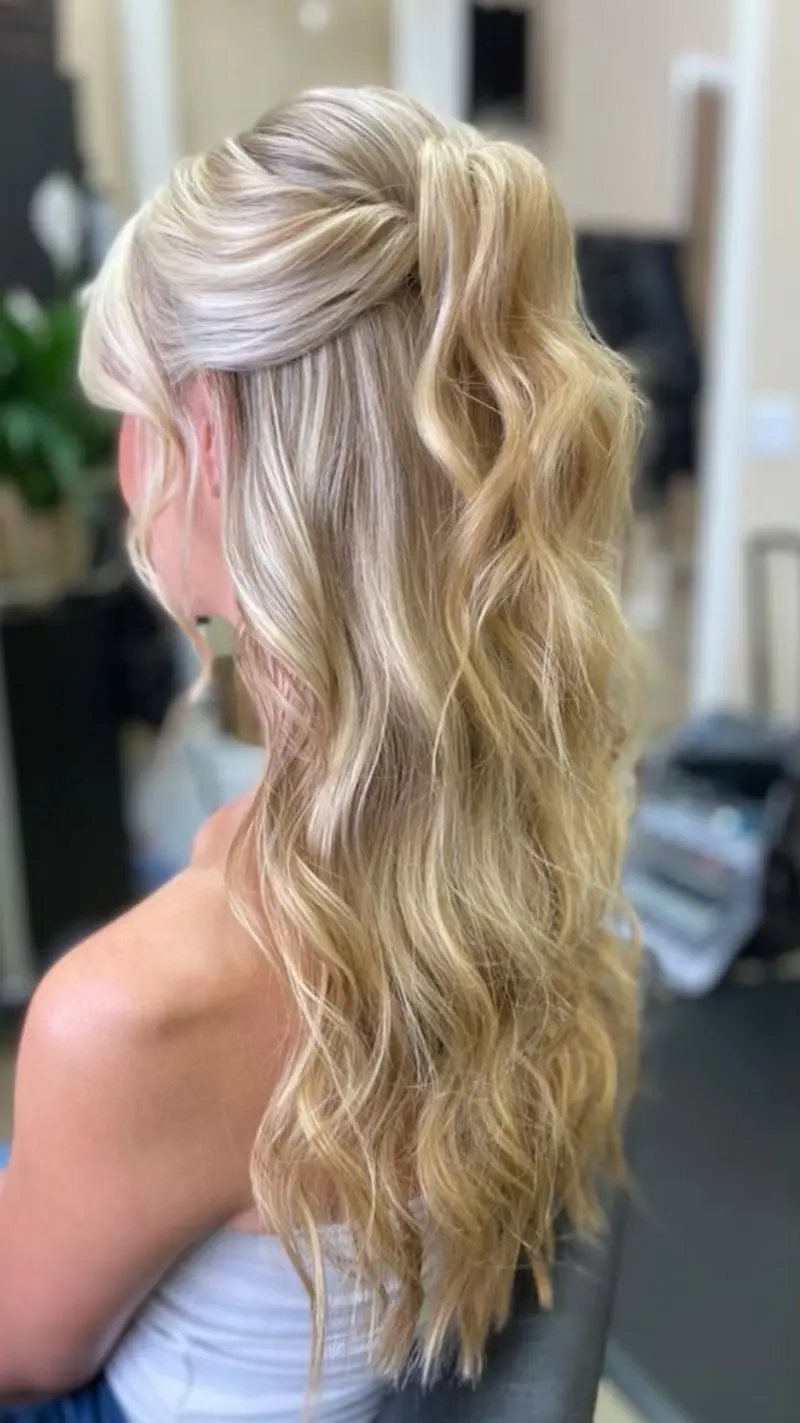 High Ponytail with Loose Waves homecoming hairstyle