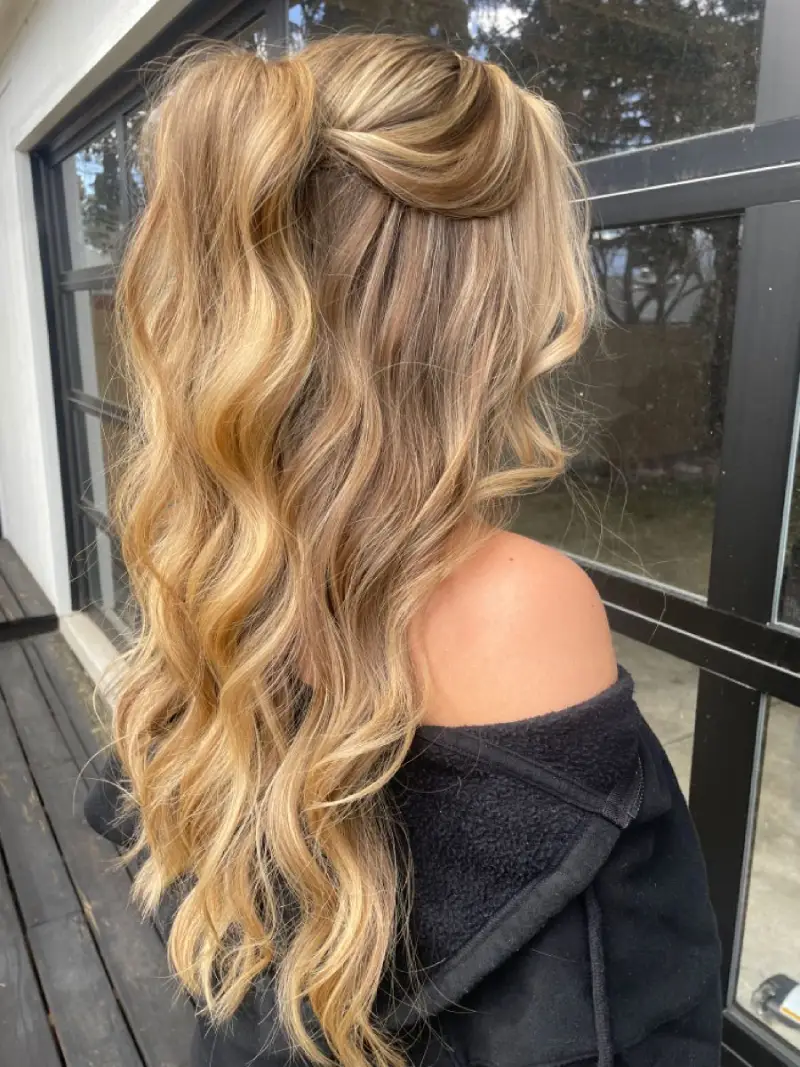 Half-Up Ponytail with Curls homecoming hairstyle