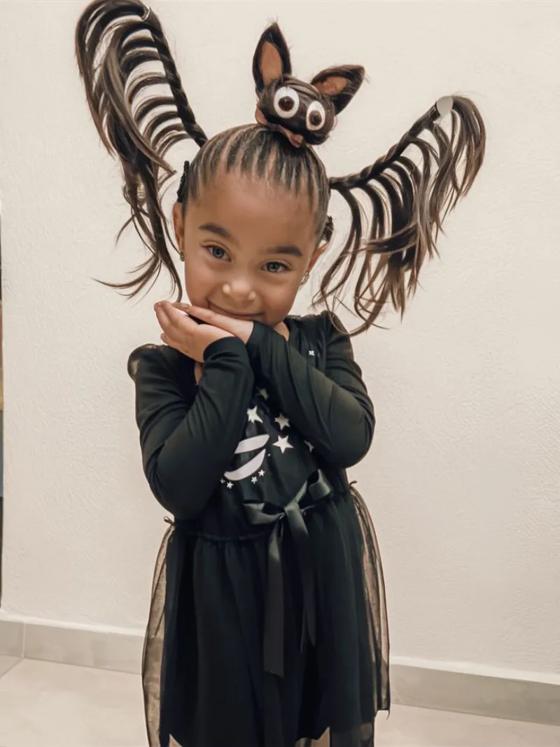 bat wing buns halloween hairstyle for kids