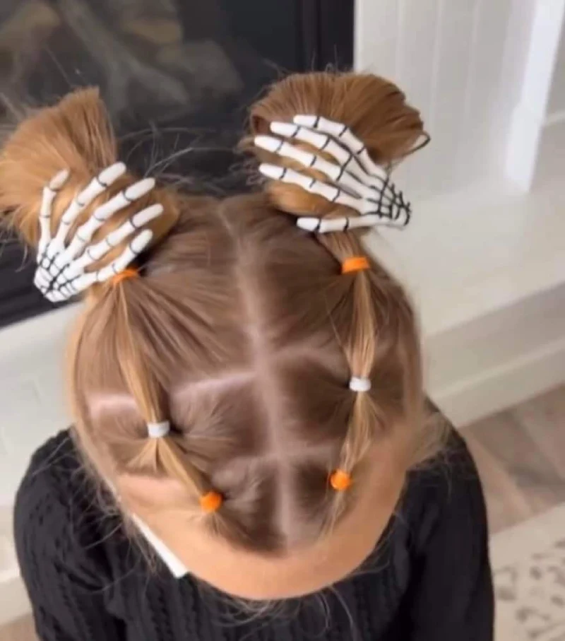 mummy wrap buns halloween hairstyle for kids