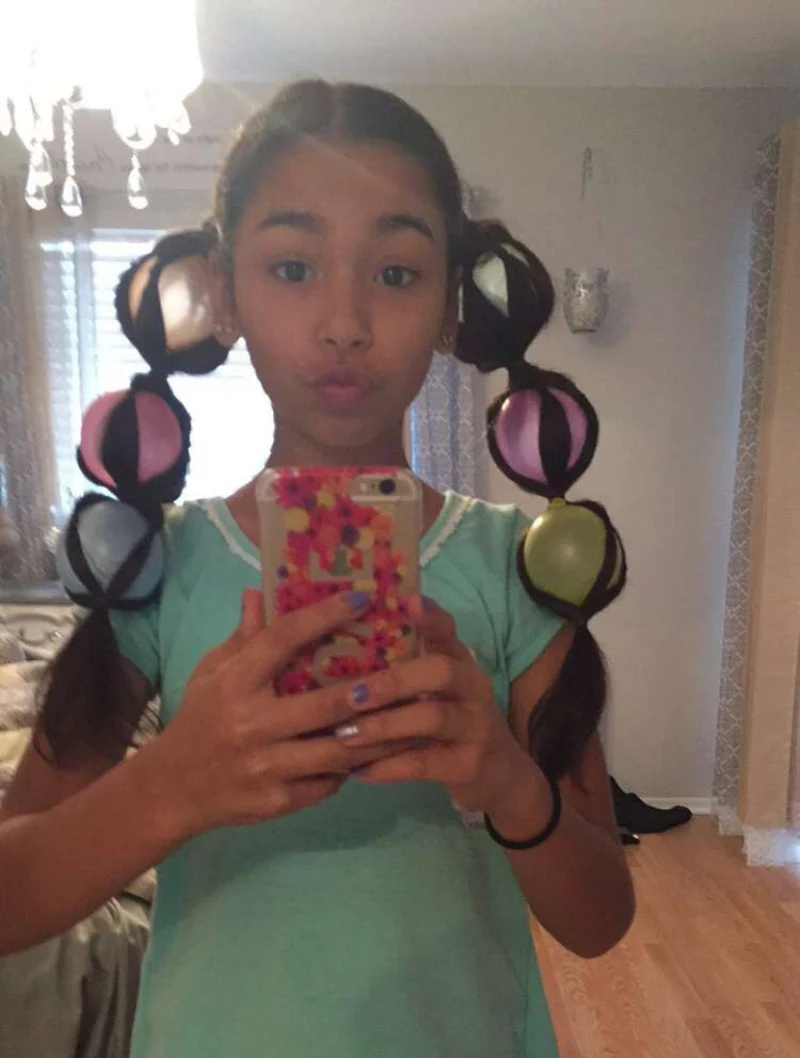 pumpkin bubble pigtails halloween hairstyle for kids