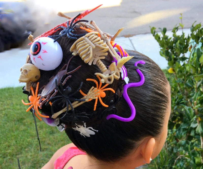 creepy eyeball bun halloween hairstyle for kids