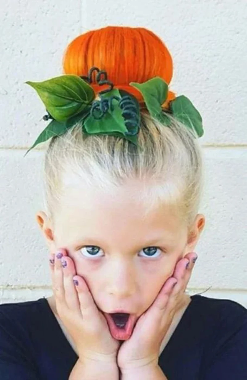 pumpkin patch bun halloween hairstyle for kids