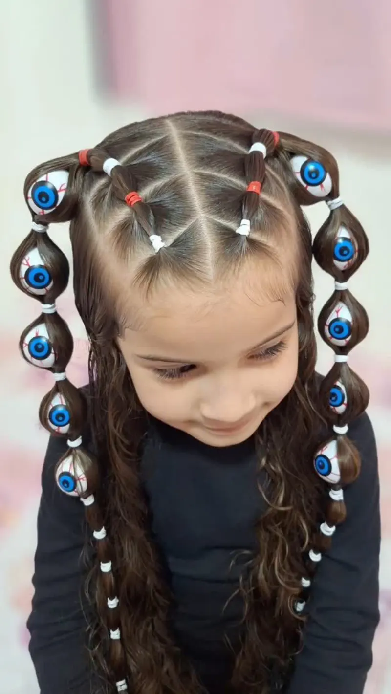 creepy eyeball braids halloween hairstyle for kids