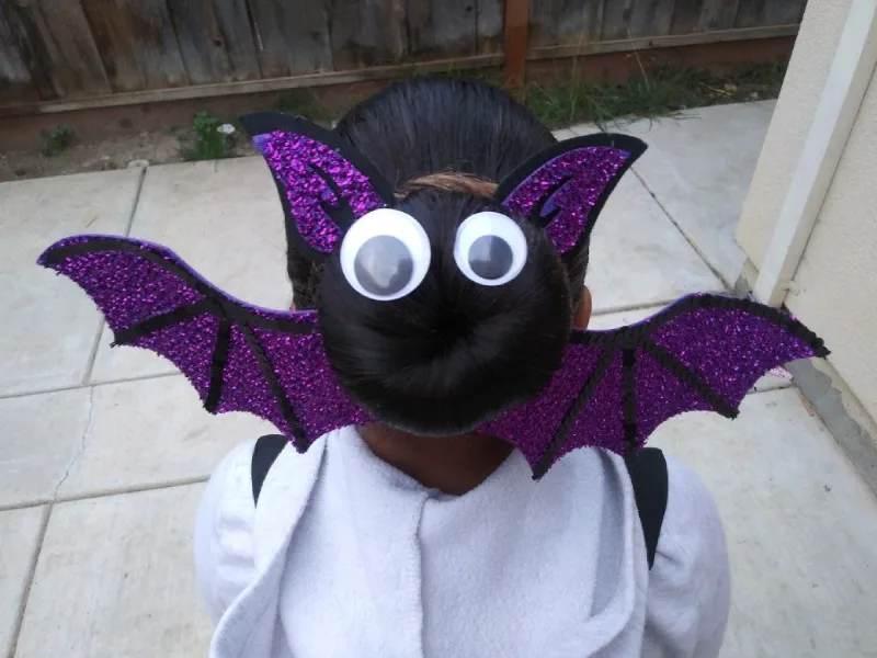 bat wing bun halloween hairstyle for kids