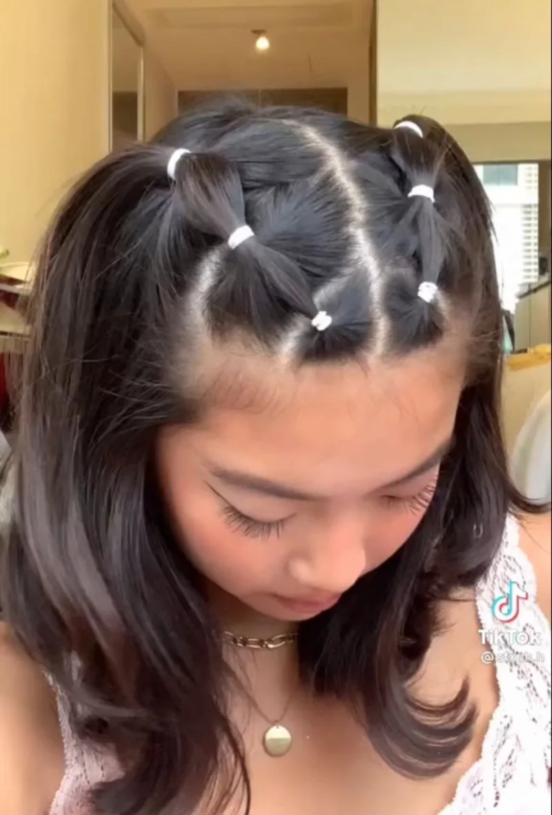 webbed braided hairstyle halloween hairstyle