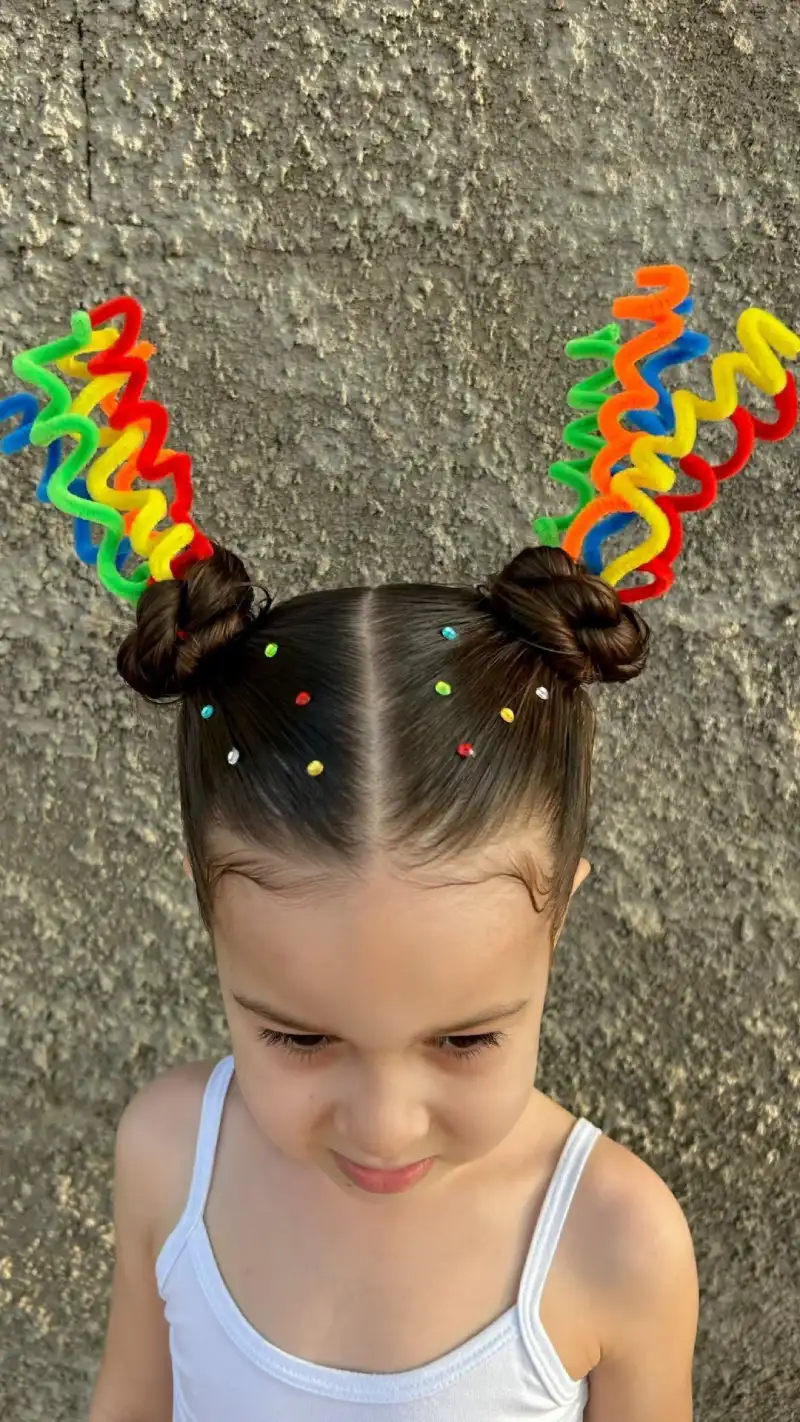 rainbow antennae buns halloween hairstyle