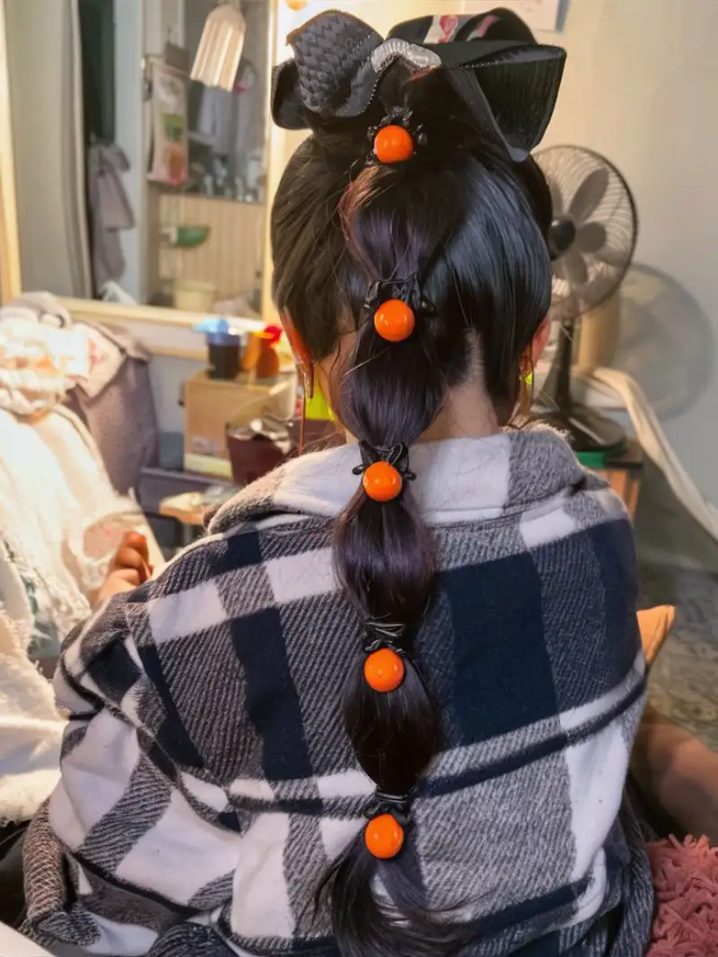 pumpkin patch ponytail halloween hairstyle