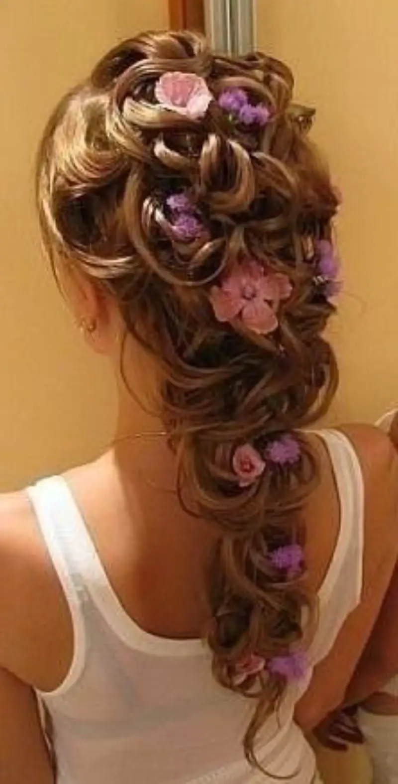 soft blossom braid rapunzel hairstyle
