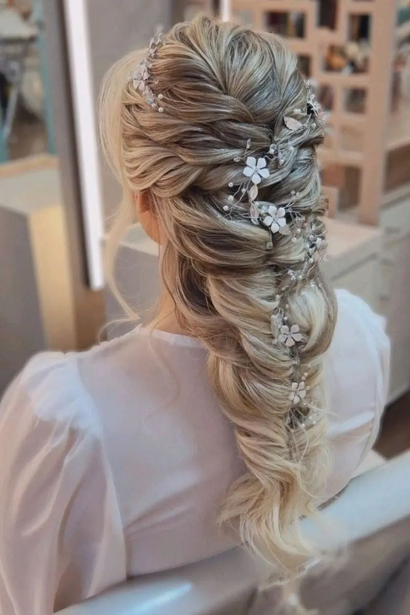 twisted half-up floral style rapunzel hairstyle