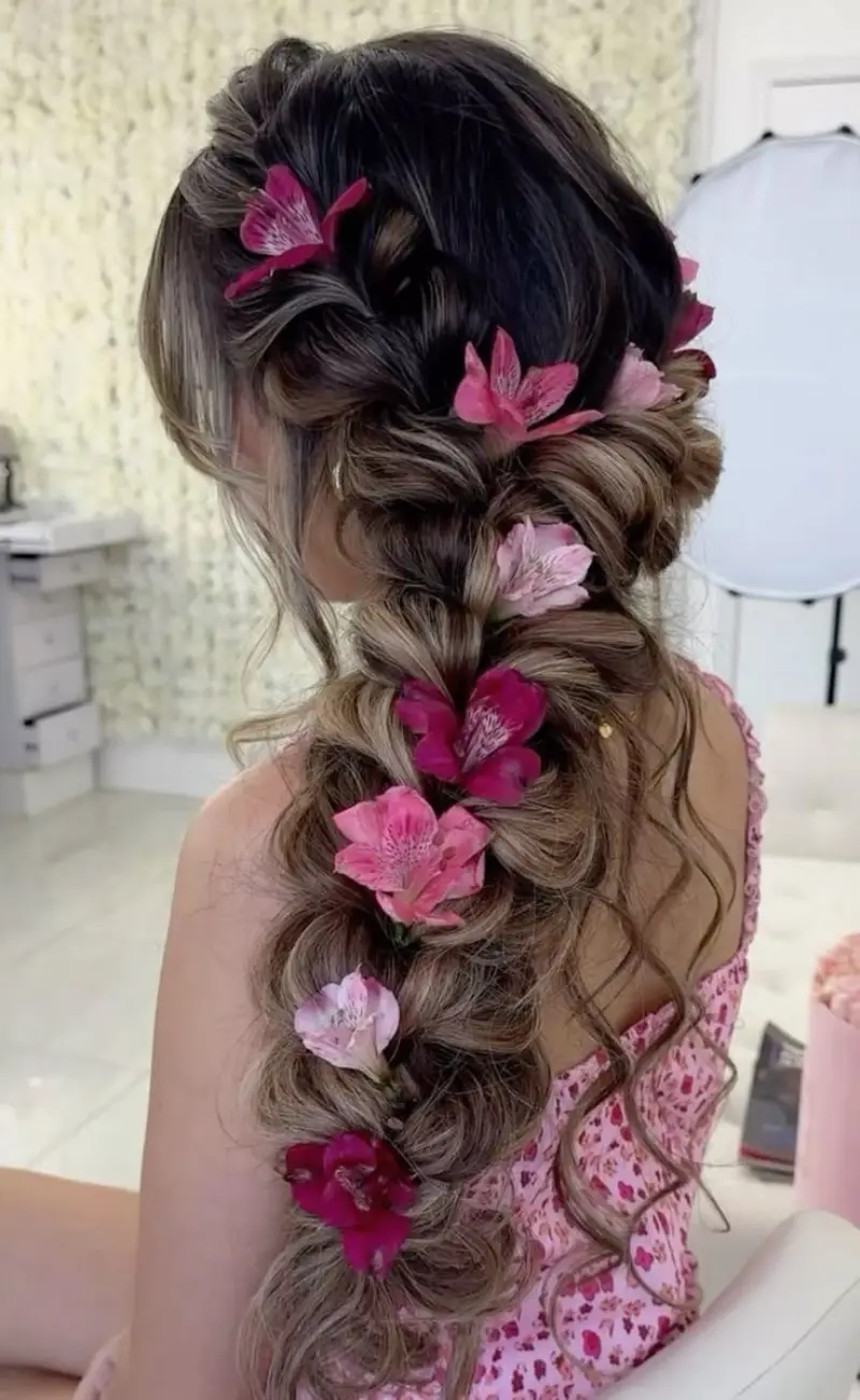burgundy petal braid rapunzel hairstyle