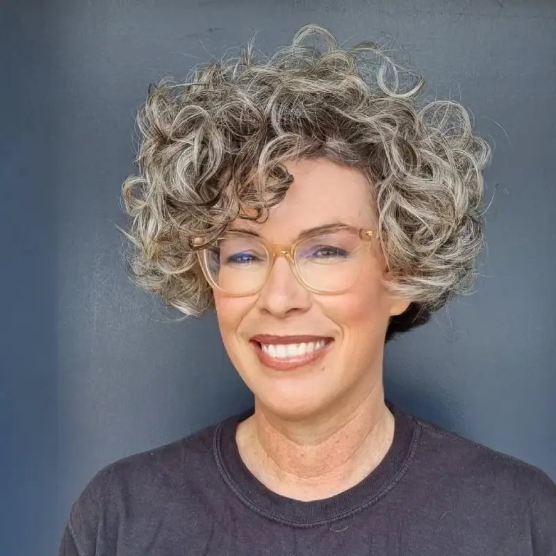 curly haircut for women over 51