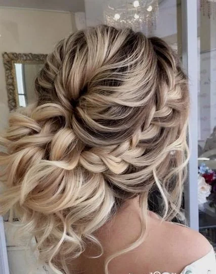 elegant braided low bun winter formal hairstyles