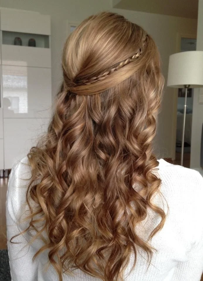 loose curly half-up  winter formal hairstyles