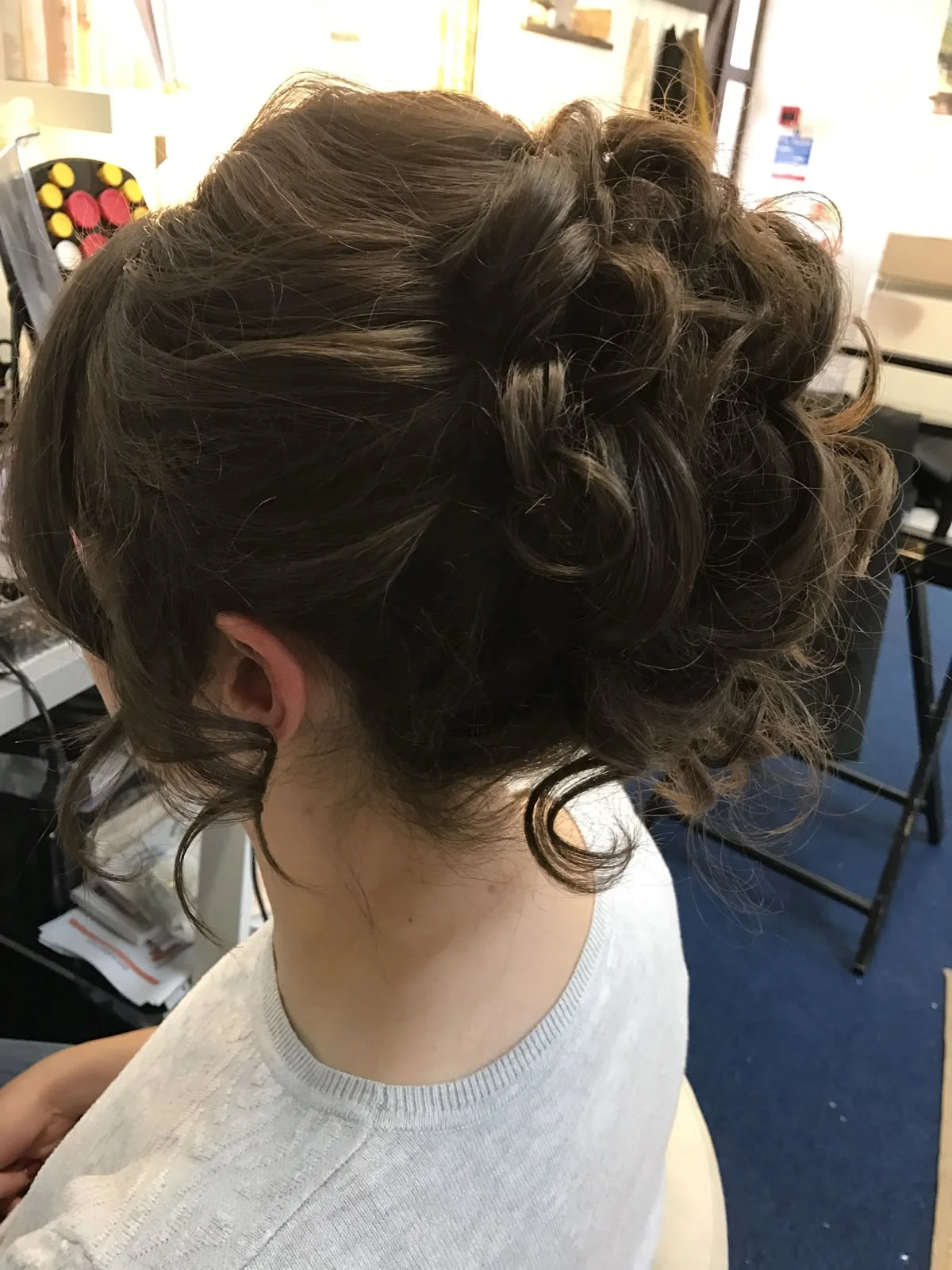 messy curly updo winter formal hairstyles